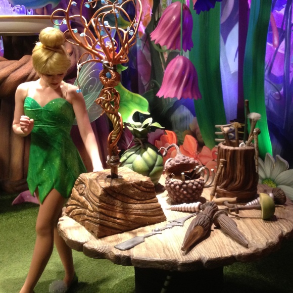 A photo of the Tinker Bell Meet And Greet at the Disney parks, featuring several fairy props designed by Chris Oatley.