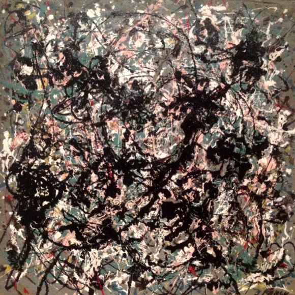 A photo of Jackson Pollock’s signature paint splatters.