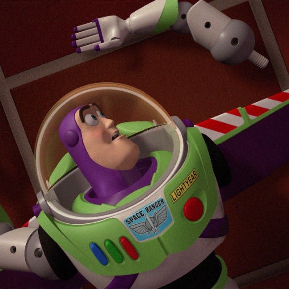 A screenshot of Toy Story’s Buzz Lightyear, lying in pieces on the ground.