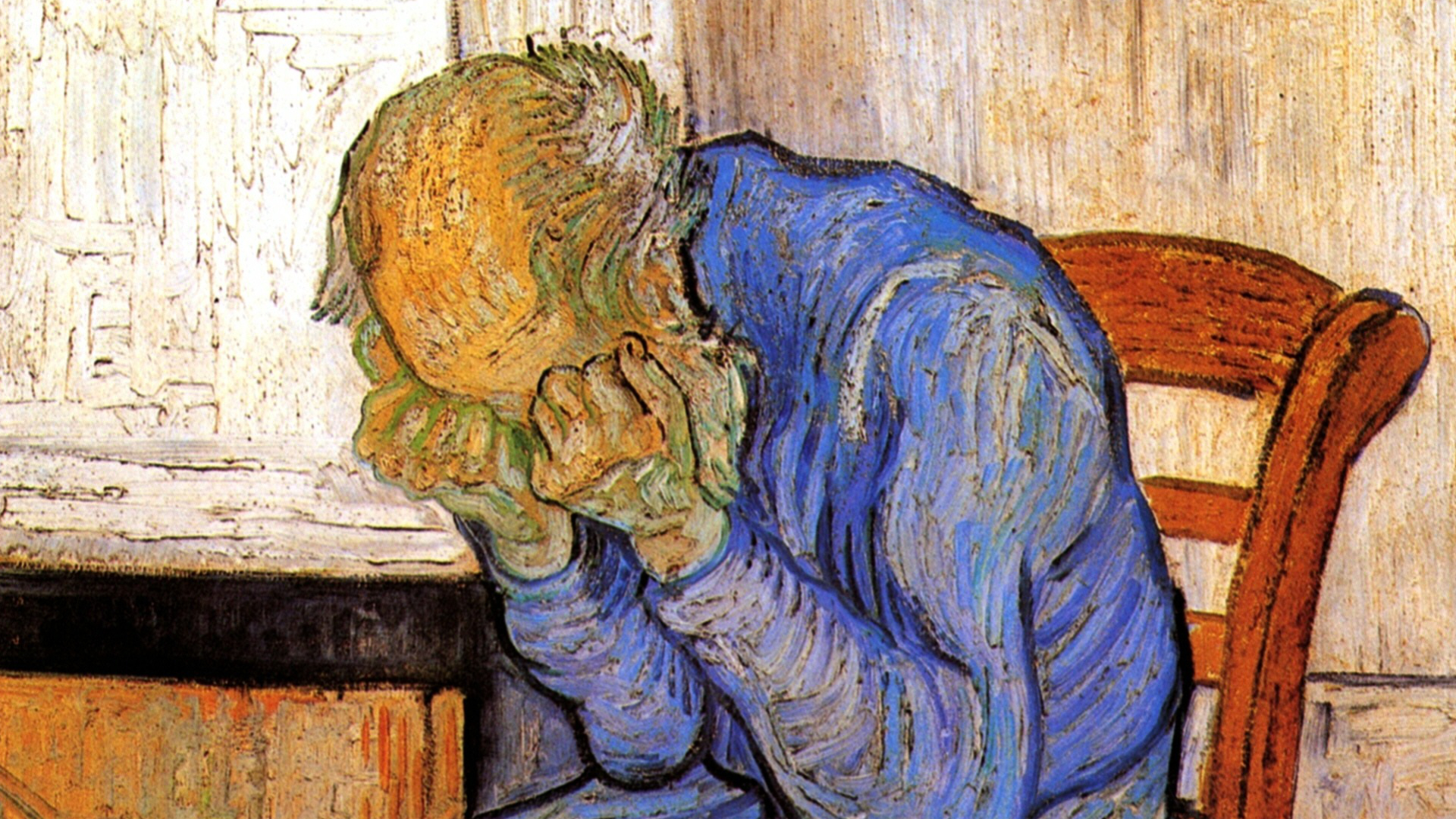 A detail of Van Gogh’s oil painting “Old Man In Sorrow” depicts an old man dressed in all blue sitting bent over in his chair, burying his face in his hands.